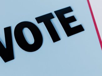 close-up-of-the-word-vote-on-a-minimal-background-emphasizing-voting-importance-1