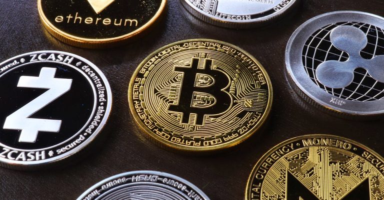 detailed-view-of-assorted-cryptocurrency-coins-including-bitcoin-ethereum-and-ripple